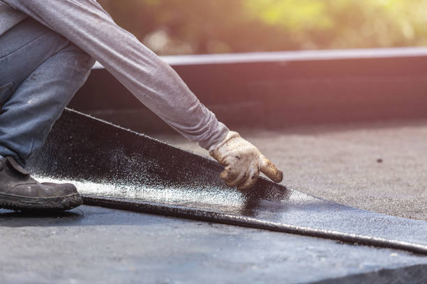 Professional Basement Waterproofing technician working in Concord, MI